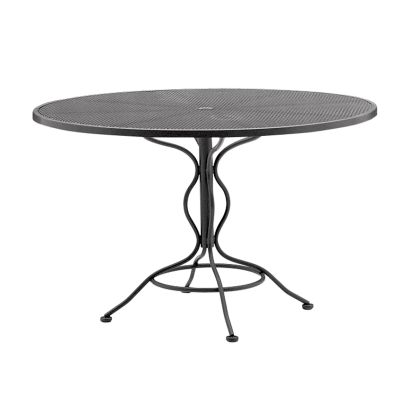 The Iron Round Dining Umbrella Table features a black metal mesh top and a twisted central support with four curved legs, offering simplicity and elegance for outdoor use.
