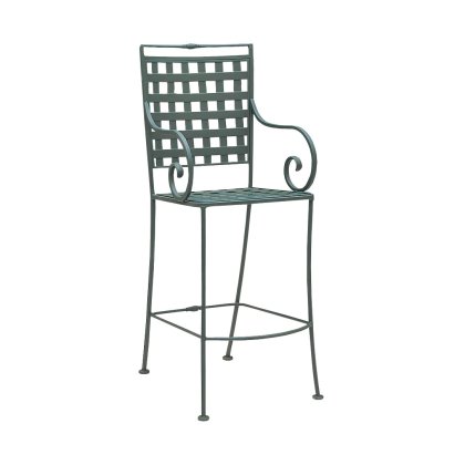 The Sheffield Stationary Bar Stool boasts a high back and armrests with a grid pattern, featuring a dark green finish. It has thin, straight legs enhanced with decorative metalwork.