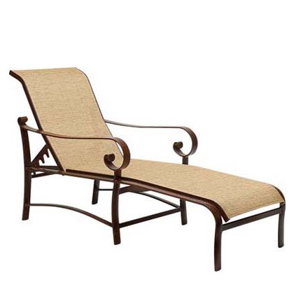 The Belden Sling Adjustable Chaise Lounge features a wooden frame with curved backrest and armrests, complemented by elegantly curved metal supports. It boasts a light brown fabric seat and backrest.