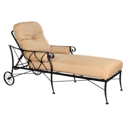 The Derby Adjustable Chaise Lounge features a stylish curved metal frame with two rear wheels and beige cushions on both the seat and backrest, offering comfort and timeless design.