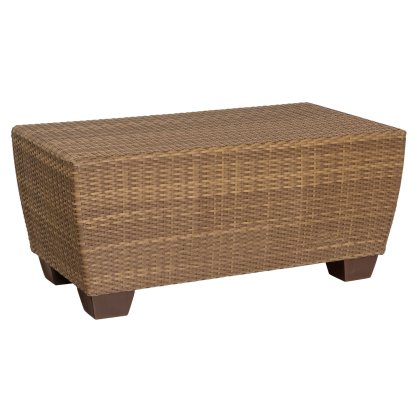 The Saddleback Rectangular Coffee Table is a natural brown wicker piece with four sturdy legs and a smooth surface, boasting a simple, elegant design for both indoor and outdoor settings.