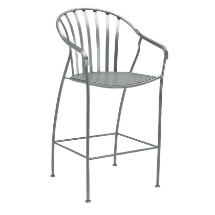 The Valencia Stationary Bar Stool is a sleek metal piece with a curved backrest featuring vertical slats, armrests, and a square footrest. Designed in a minimalist style, it has a slightly curved solid seat for comfort and comes in polished metallic gray.