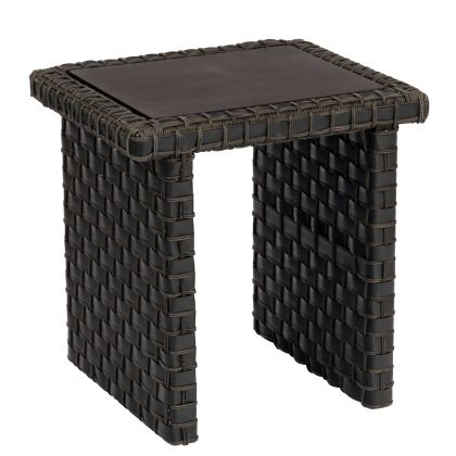 The Cooper Side Table is a rectangular woven wicker piece with a flat top and open sides. It has a dark brown color and sturdy design, making it ideal for both indoor and outdoor use.