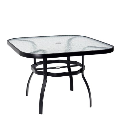 The Deluxe Obscure Glass Square Dining Umbrella Table has a textured square glass top, a central umbrella hole, and a black metal frame with four curved legs.