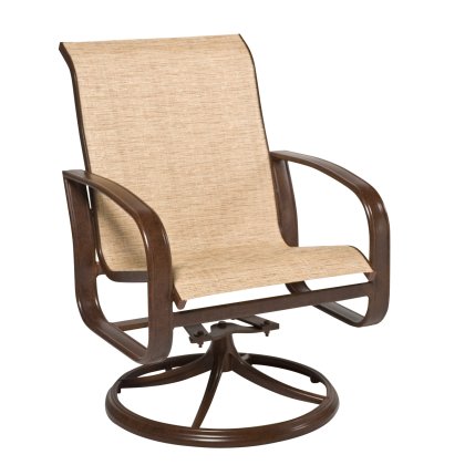 The Cayman Isle Sling Swivel Rocking Dining Armchair features a modern, minimalist design with curved armrests and light beige fabric on the seat and backrest, all set on a circular base.