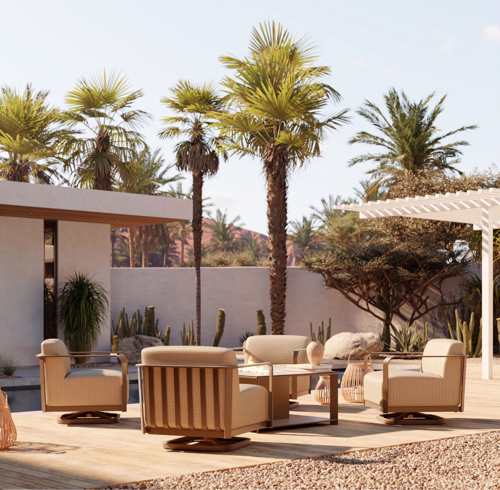 A modern outdoor patio with four Juno reticulated woven cushioned aluminum outdoor furniture chairs around a square coffee table, set on a wooden deck. Palm trees and desert plants surround the area under a clear sky.